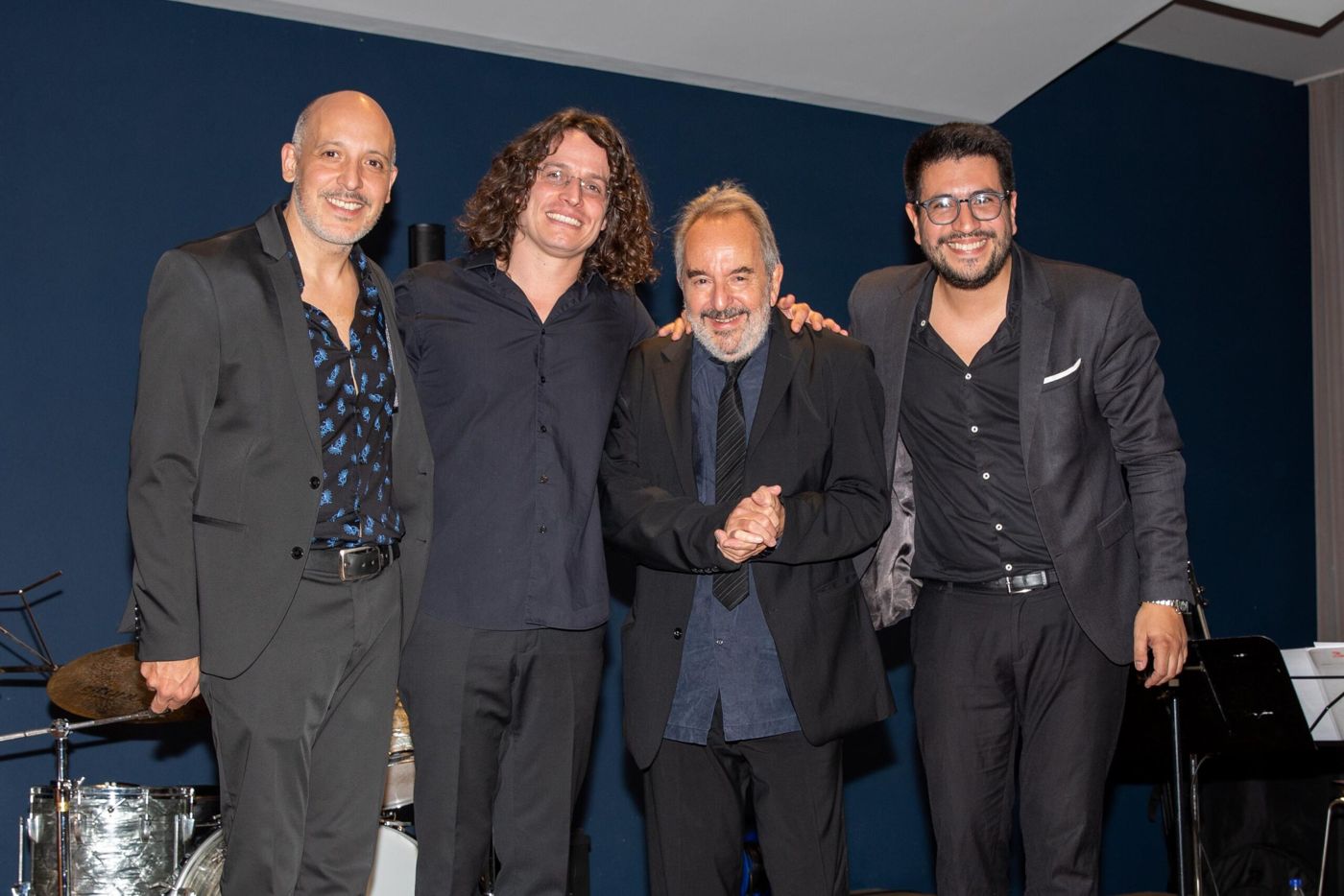 Luis Ceravolo 4 taking a bow on stage at the Kulturklub Wanderbühne Egnach, Switzerland, April 2023. Luis Ceravolo is third from left.