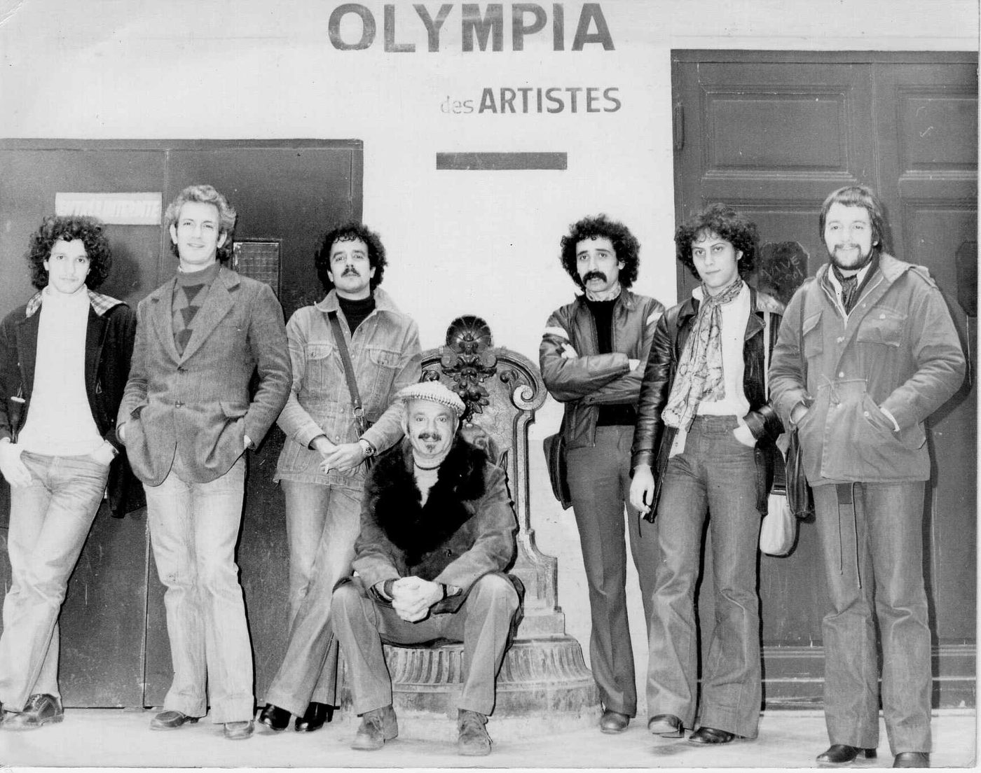 The Electronic Octet at the Olympia artists’ entrance, Paris, 1977, with Astor Piazzolla seated in the centre. Luis Ceravolo stands far right.